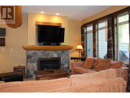 1351 Gerry Sorensen Way Unit# O3-C, Kimberley, BC - Indoor Photo Showing Living Room With Fireplace