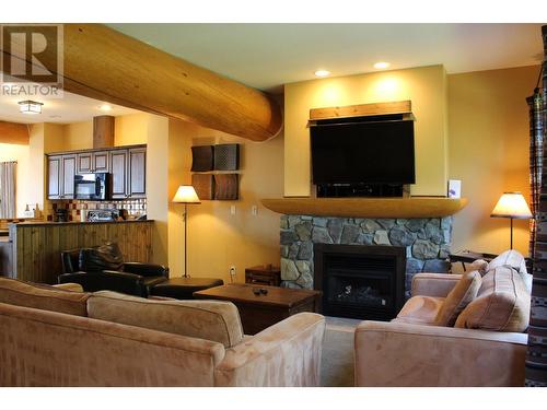 1351 Gerry Sorensen Way Unit# O3-C, Kimberley, BC - Indoor Photo Showing Living Room With Fireplace