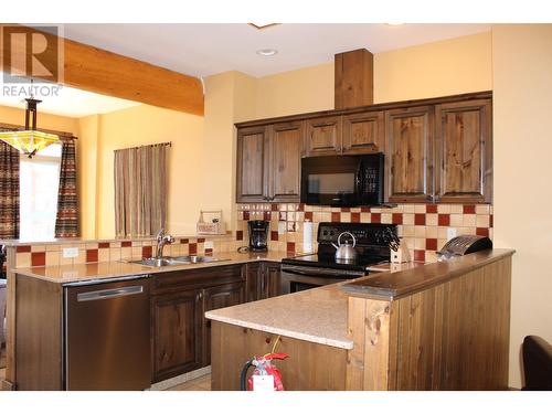 1351 Gerry Sorensen Way Unit# O3-C, Kimberley, BC - Indoor Photo Showing Kitchen With Double Sink