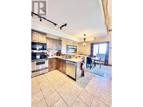 1351 Gerry Sorensen  Way Unit# G5-D, Kimberley, BC - Indoor Photo Showing Kitchen With Double Sink