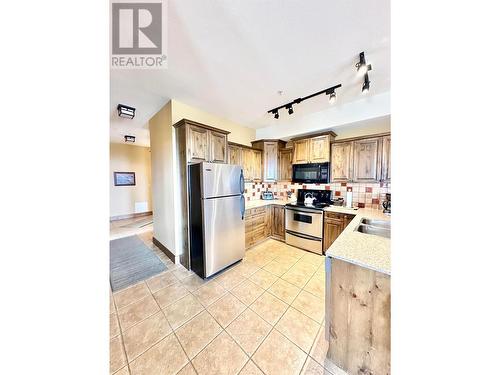 1351 Gerry Sorensen  Way Unit# G5-D, Kimberley, BC - Indoor Photo Showing Kitchen With Double Sink