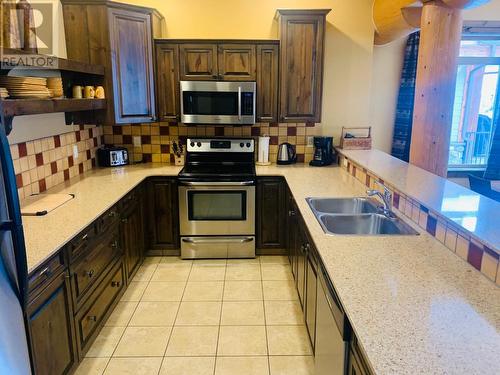1351 Gerry Sorensen Way Unit# M4-A, Kimberley, BC - Indoor Photo Showing Kitchen With Double Sink