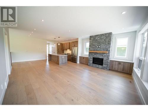 153 The Whins, Cranbrook, BC - Indoor Photo Showing Living Room With Fireplace