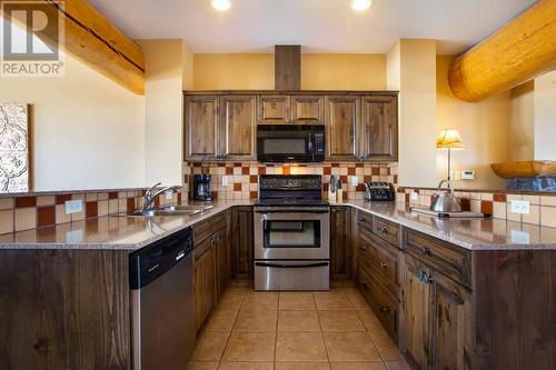 1351 Gerry Sorensen Way Unit# J2-D, Kimberley, BC - Indoor Photo Showing Kitchen With Double Sink