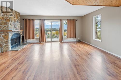 2303 Crawford  Street Unit# 1/2/3, Creston, BC - Indoor Photo Showing Living Room With Fireplace