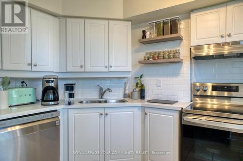 712 - 8 Rean Drive, Toronto, ON - Indoor Photo Showing Kitchen With Double Sink