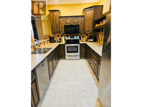 1351 Gerry Sorensen Way Unit# M1-A, Kimberley, BC - Indoor Photo Showing Kitchen With Double Sink