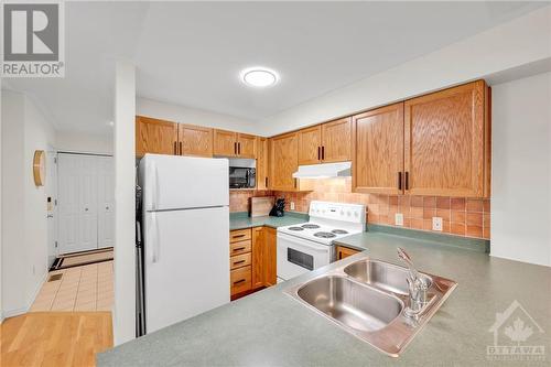 14 Strathaven Private, Ottawa, ON - Indoor Photo Showing Kitchen With Double Sink