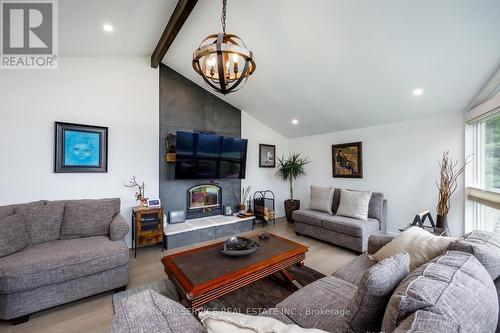 94 Morton Line, Cavan Monaghan, ON - Indoor Photo Showing Living Room With Fireplace