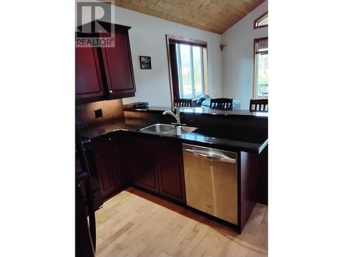 453 13Th  Avenue, Invermere, BC - Indoor Photo Showing Kitchen With Double Sink