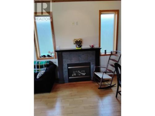 453 13Th  Avenue, Invermere, BC - Indoor Photo Showing Living Room With Fireplace