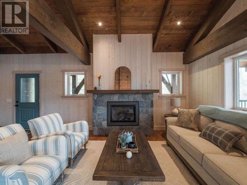 23 Birch Bend Grove, Kaslo, BC - Indoor Photo Showing Living Room With Fireplace