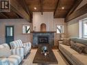 23 Birch Bend Grove, Kaslo, BC  - Indoor Photo Showing Living Room With Fireplace 