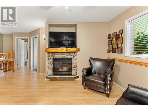 1200 Riverside  Way Unit# 1222, Fernie, BC - Indoor Photo Showing Living Room With Fireplace