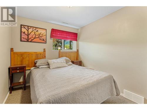 1200 Riverside  Way Unit# 1222, Fernie, BC - Indoor Photo Showing Bedroom