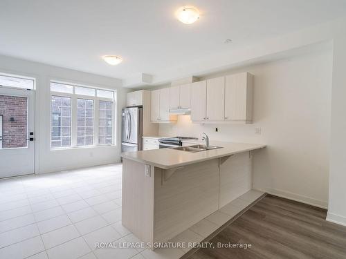 70-23 Selfridge Way, Whitby, ON - Indoor Photo Showing Kitchen With Double Sink