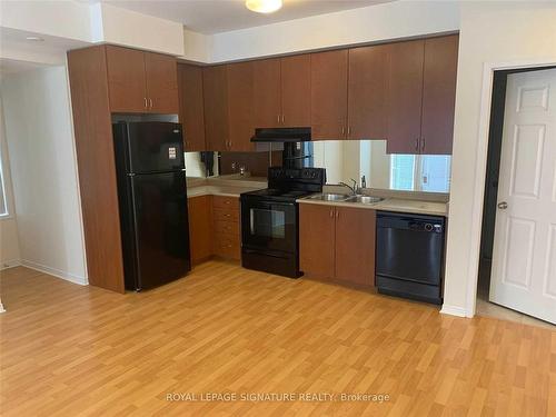 44-5035 Oscar Peterson Blvd, Mississauga, ON - Indoor Photo Showing Kitchen With Double Sink