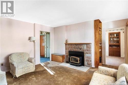 21 Kennedy Court, Fredericton, NB - Indoor Photo Showing Living Room With Fireplace