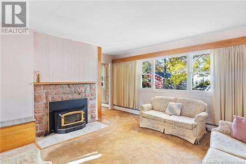 21 Kennedy Court, Fredericton, NB - Indoor Photo Showing Living Room With Fireplace