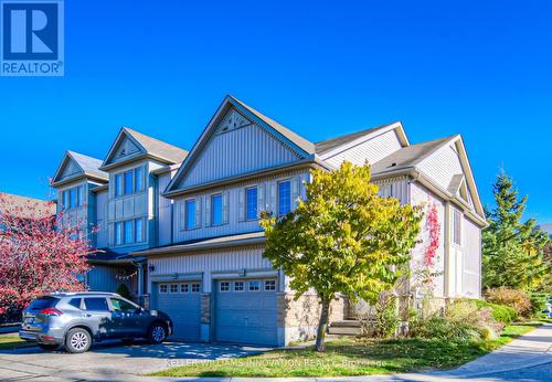 E29 - 85 Bankside Drive, Kitchener, ON - Outdoor With Facade