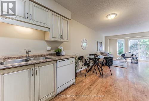 E29 - 85 Bankside Drive, Kitchener, ON - Indoor Photo Showing Kitchen With Double Sink