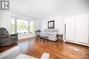 7858 Decarie Drive, Ottawa, ON  - Indoor Photo Showing Living Room 