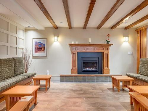 216-5650 Edgewater Lane, Nanaimo, BC - Indoor Photo Showing Living Room With Fireplace