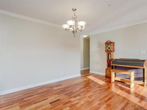 111-4480 Chatterton Way, Saanich, BC - Indoor With Fireplace