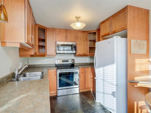 111-4480 Chatterton Way, Saanich, BC - Indoor Photo Showing Kitchen With Double Sink