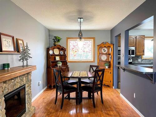 28 Michano Drive, Marathon, ON - Indoor Photo Showing Dining Room With Fireplace