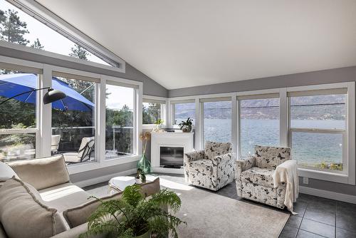 10837 Okanagan Centre Road, Lake Country, BC - Indoor Photo Showing Living Room With Fireplace