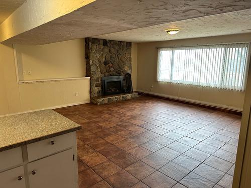 7910 Lakeview Drive, Coldstream, BC - Indoor Photo Showing Other Room With Fireplace