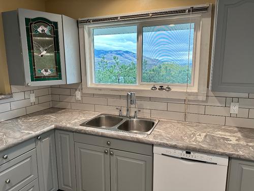 7910 Lakeview Drive, Coldstream, BC - Indoor Photo Showing Kitchen With Double Sink