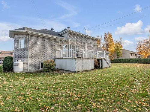 Back facade - 307 Av. Des Chênes, Sainte-Marie, QC - Outdoor With Above Ground Pool