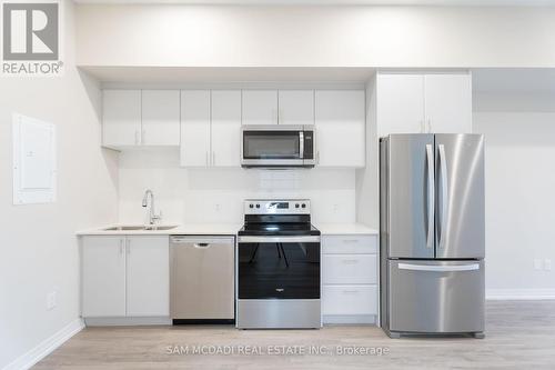 Uph 50 - 50 Herrick Avenue, St. Catharines, ON - Indoor Photo Showing Kitchen With Stainless Steel Kitchen With Double Sink With Upgraded Kitchen