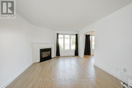 94 Highbury Drive, Hamilton, ON - Indoor Photo Showing Living Room With Fireplace