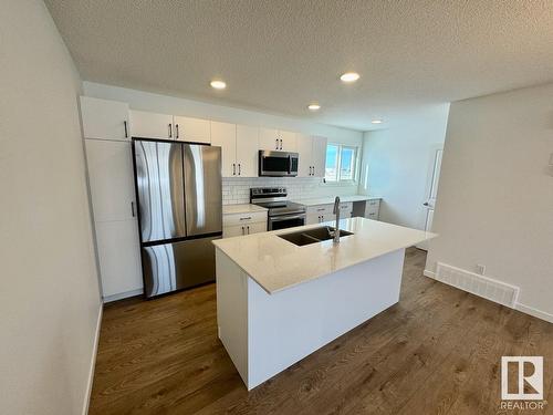 485 Desrochers Bv Sw, Edmonton, AB - Indoor Photo Showing Kitchen With Double Sink With Upgraded Kitchen