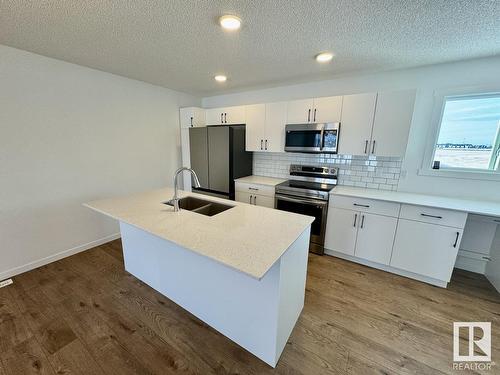 485 Desrochers Bv Sw, Edmonton, AB - Indoor Photo Showing Kitchen With Double Sink With Upgraded Kitchen