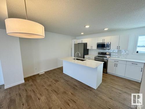 485 Desrochers Bv Sw, Edmonton, AB - Indoor Photo Showing Kitchen With Double Sink With Upgraded Kitchen