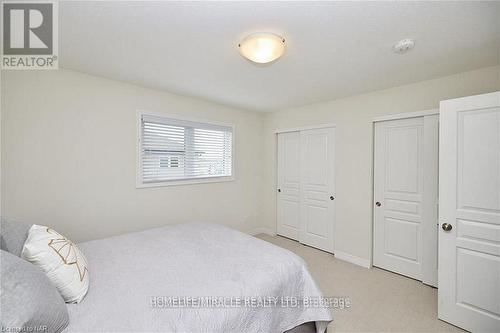 41 - 7768 Ascot Circle, Niagara Falls, ON - Indoor Photo Showing Bedroom