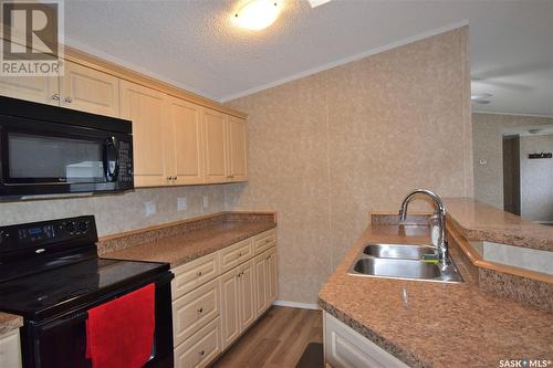 513 Brook Crescent, Shellbrook, SK - Indoor Photo Showing Kitchen With Double Sink