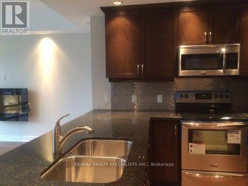 #202 - 205 Lakeshore Road W, Oakville, ON - Indoor Photo Showing Kitchen With Stainless Steel Kitchen With Double Sink