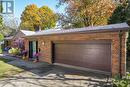 Discrete entrance and double car garage - 456 Jarvis Street, London, ON  - Outdoor 