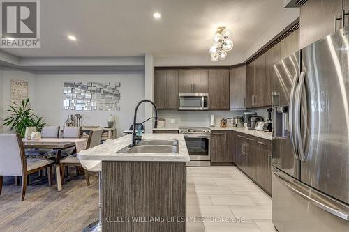 357 Edgevalley Road, London, ON - Indoor Photo Showing Kitchen With Stainless Steel Kitchen With Double Sink