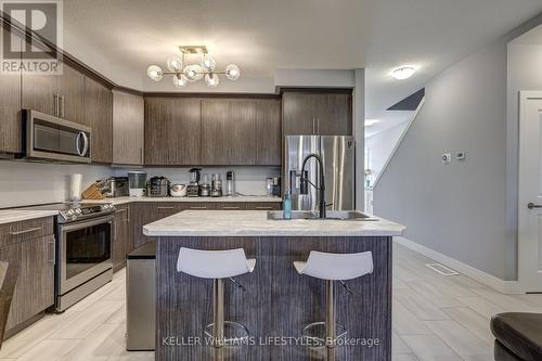 357 Edgevalley Road, London, ON - Indoor Photo Showing Kitchen With Stainless Steel Kitchen With Upgraded Kitchen