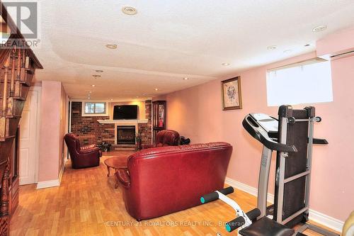 51 Ridge Road, Toronto, ON - Indoor Photo Showing Gym Room With Fireplace