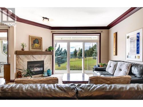 2377 Shannon Woods Drive Unit# 212, West Kelowna, BC - Indoor Photo Showing Living Room With Fireplace