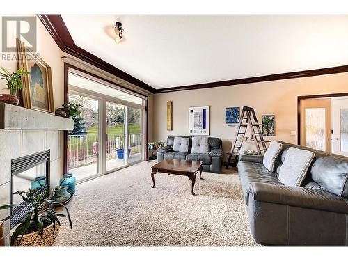 2377 Shannon Woods Drive Unit# 212, West Kelowna, BC - Indoor Photo Showing Living Room With Fireplace