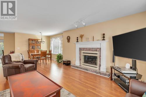 203 Biggar Road, Kelowna, BC - Indoor Photo Showing Living Room With Fireplace