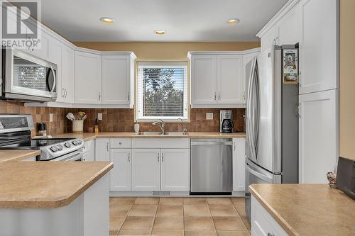 203 Biggar Road, Kelowna, BC - Indoor Photo Showing Kitchen With Double Sink